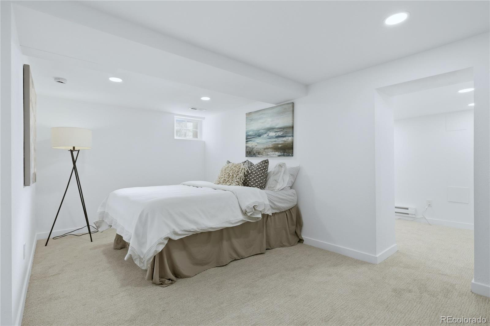 3051 West 37th Avenue Denver, CO 80211 - Photo 29 of 37 a bed room with a bed and a night stand