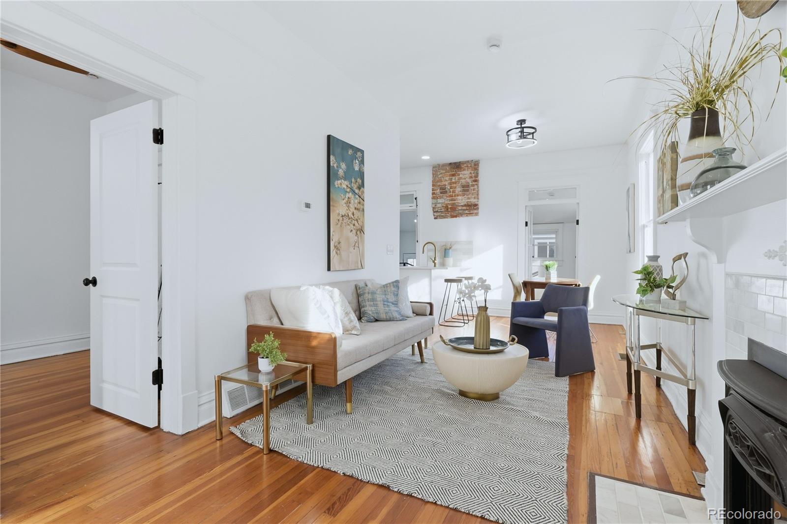 3051 West 37th Avenue Denver, CO 80211 - Photo 9 of 37 a living room with furniture and wooden floor
