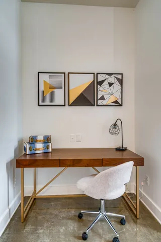 a bathroom with a granite countertop sink a toilet and bathtub