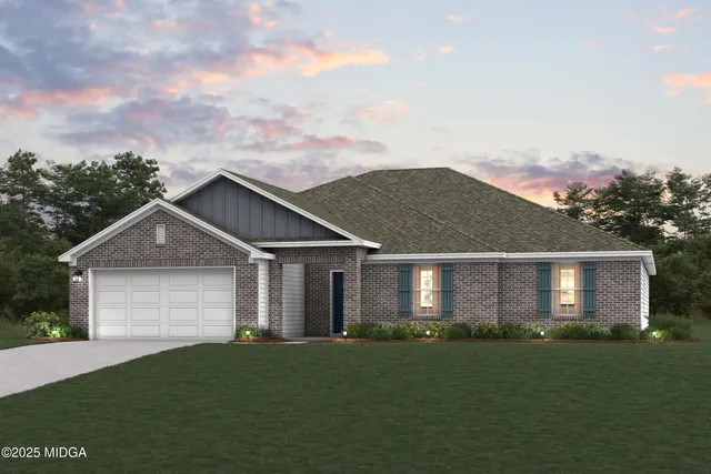 front view of a house and a yard