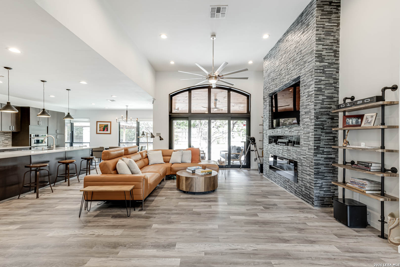 15919 Mission Ridge San Antonio, TX 78232 - Photo 11 of 43 a living room with fireplace furniture and a flat screen tv
