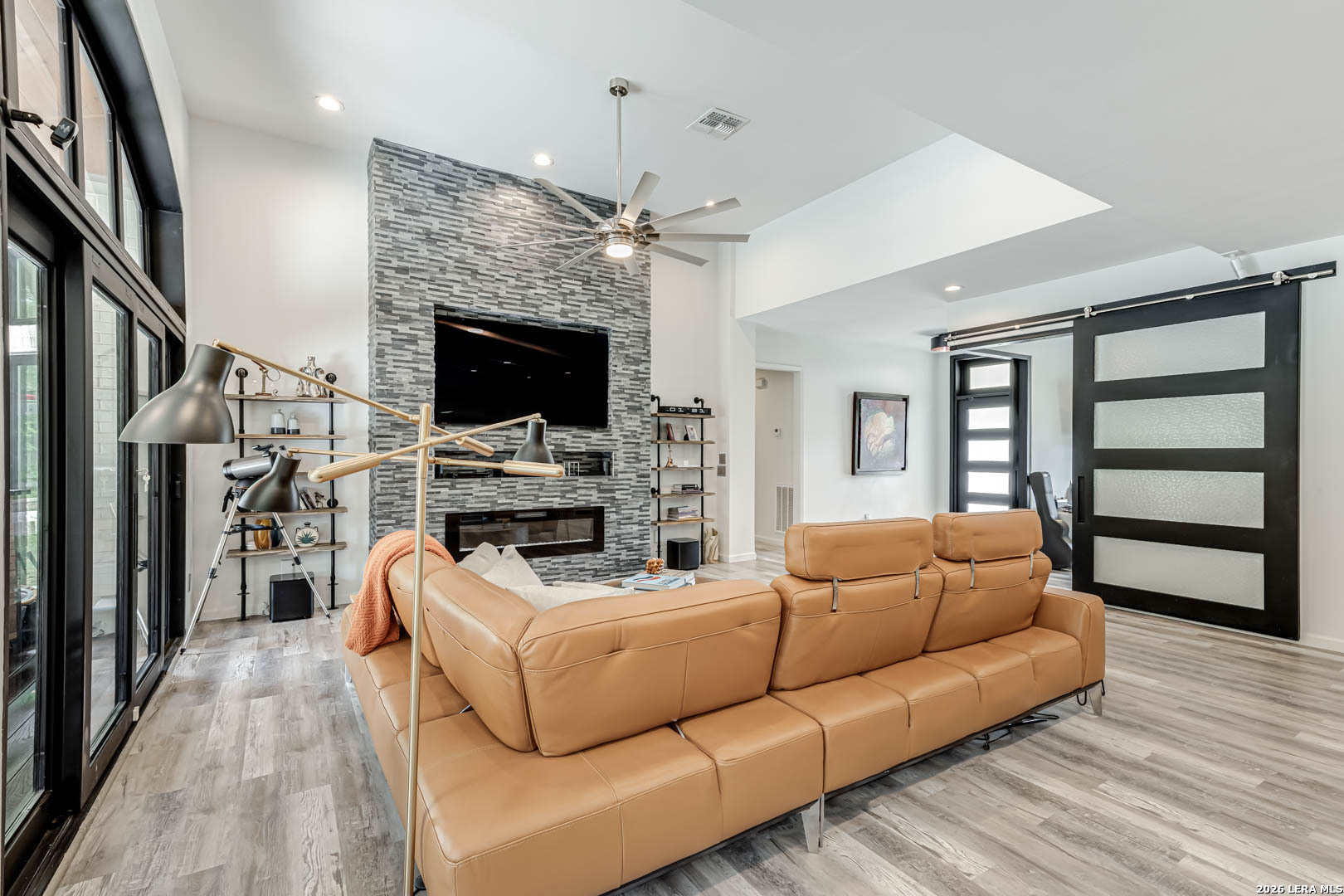 15919 Mission Ridge San Antonio, TX 78232 - Photo 13 of 43 a living room with furniture and a flat screen tv