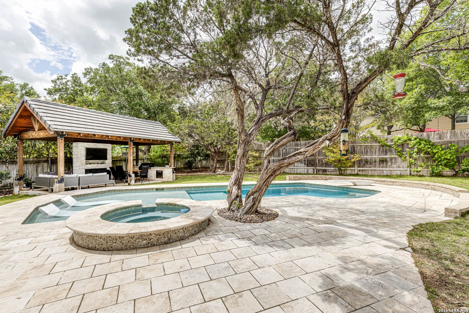 15919 Mission Ridge San Antonio, TX 78232 - Photo 2 of 43 a view of a house with swimming pool and sitting area