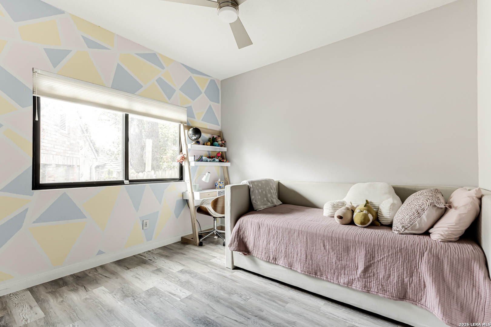 15919 Mission Ridge San Antonio, TX 78232 - Photo 31 of 43 a bedroom with a bed and window