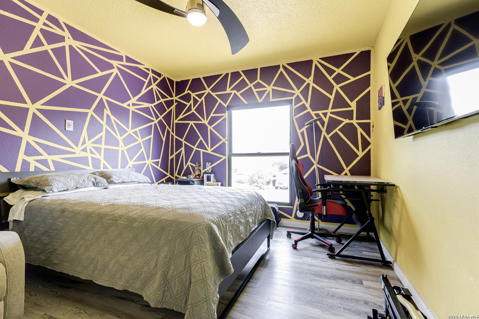 15919 Mission Ridge San Antonio, TX 78232 - Photo 34 of 43 a bedroom with a bed and a mirror on the wall