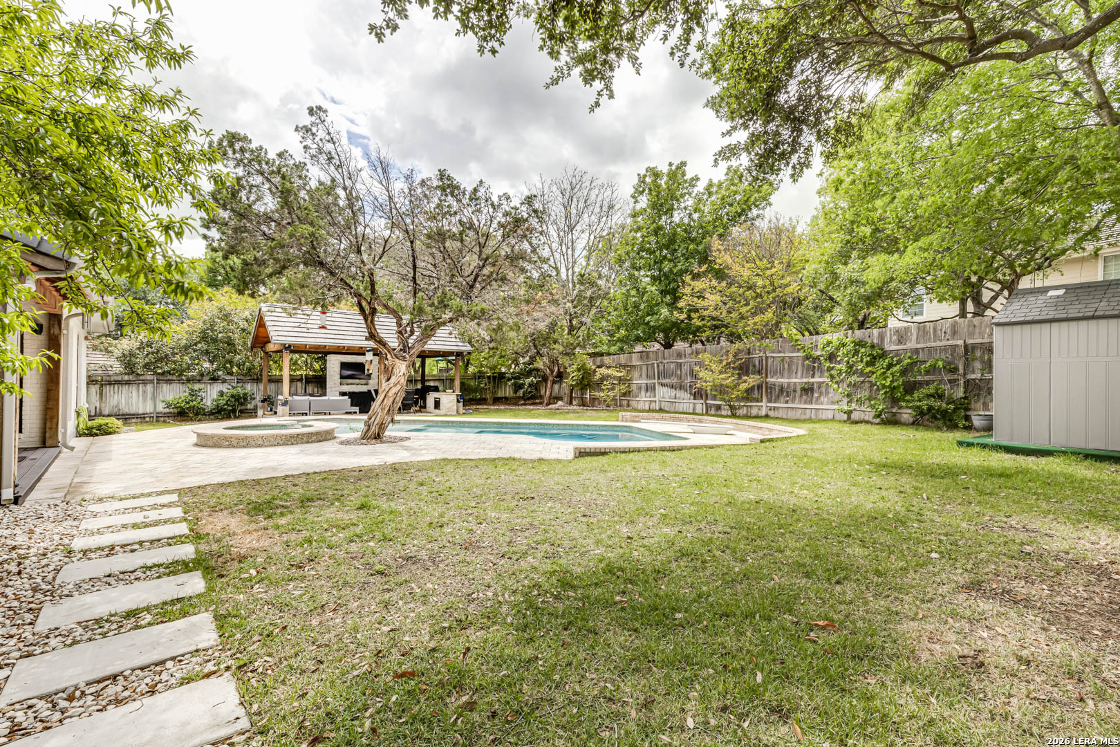 15919 Mission Ridge San Antonio, TX 78232 - Photo 38 of 43 a view of yard with swimming pool and trees