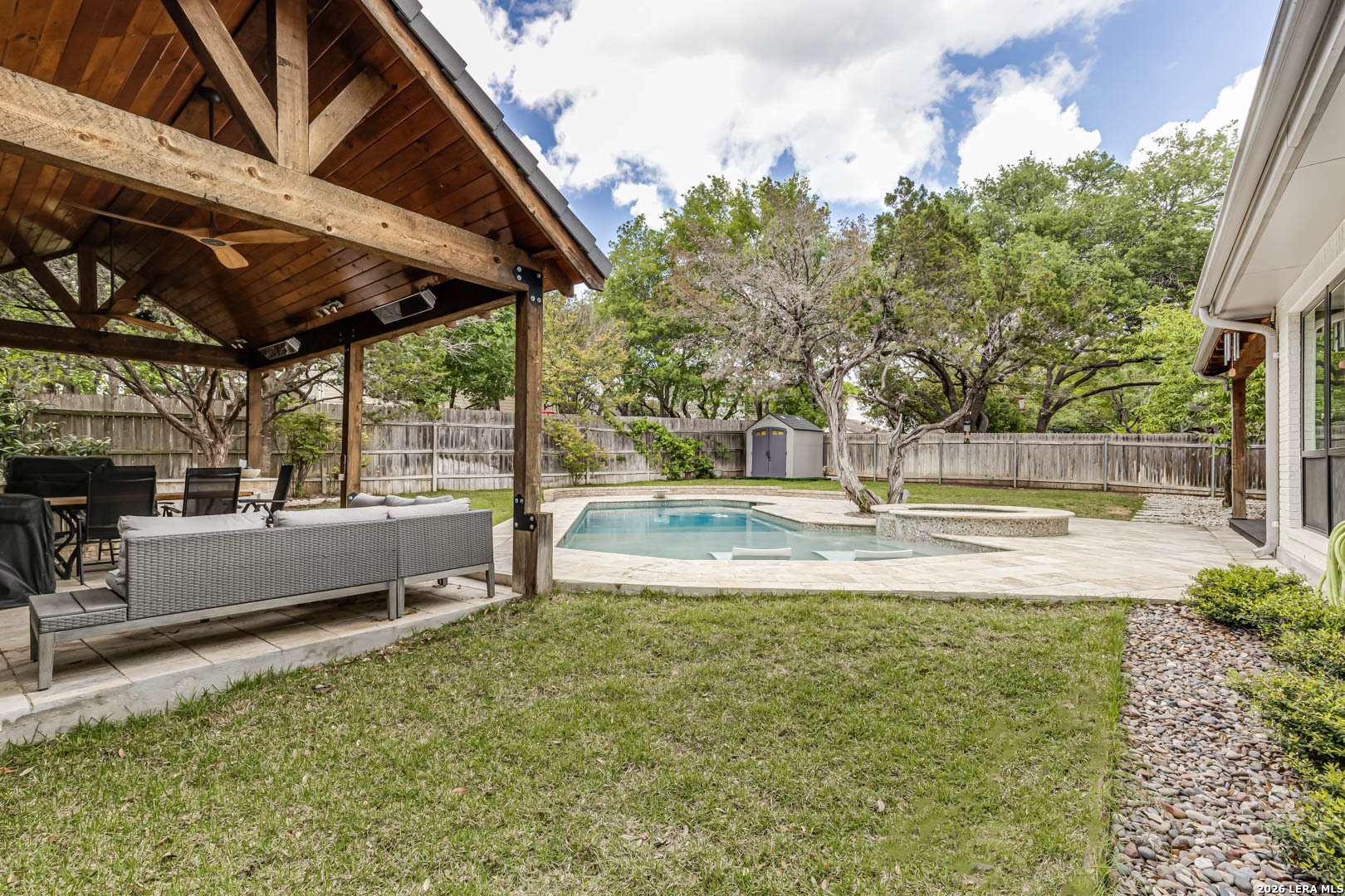 15919 Mission Ridge San Antonio, TX 78232 - Photo 39 of 43 a view of pool with a bench and trees