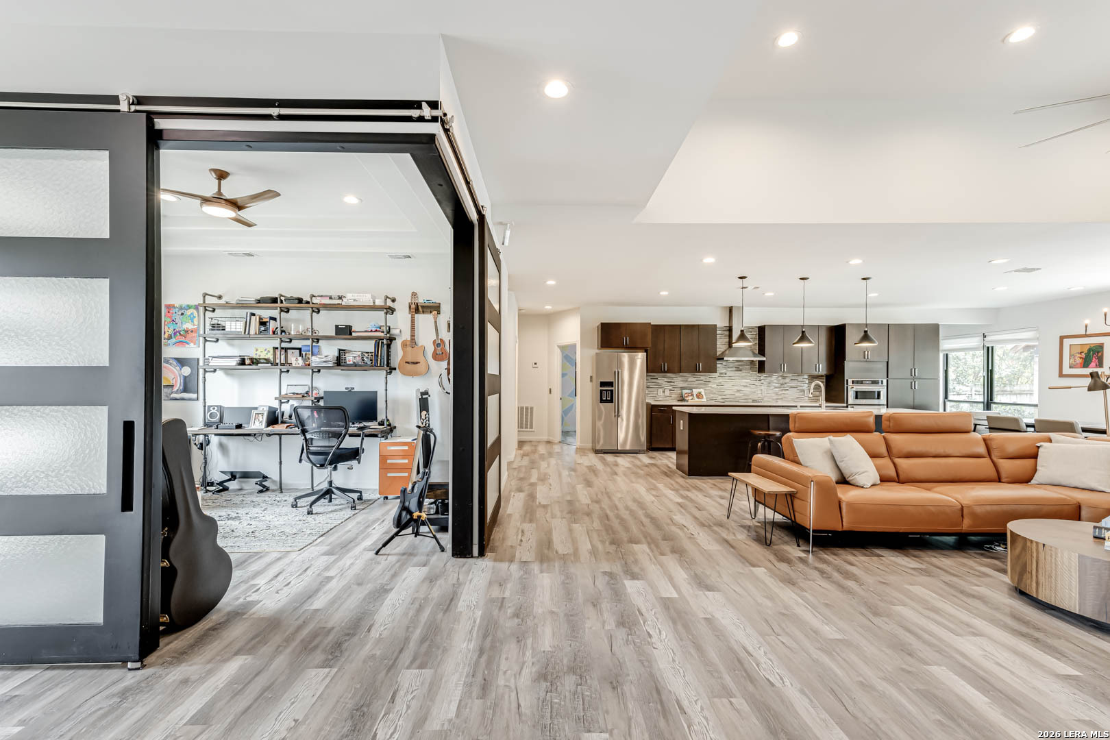 15919 Mission Ridge San Antonio, TX 78232 - Photo 9 of 43 a living room with furniture and a large window