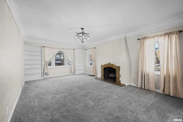 a view of a livingroom with a fireplace