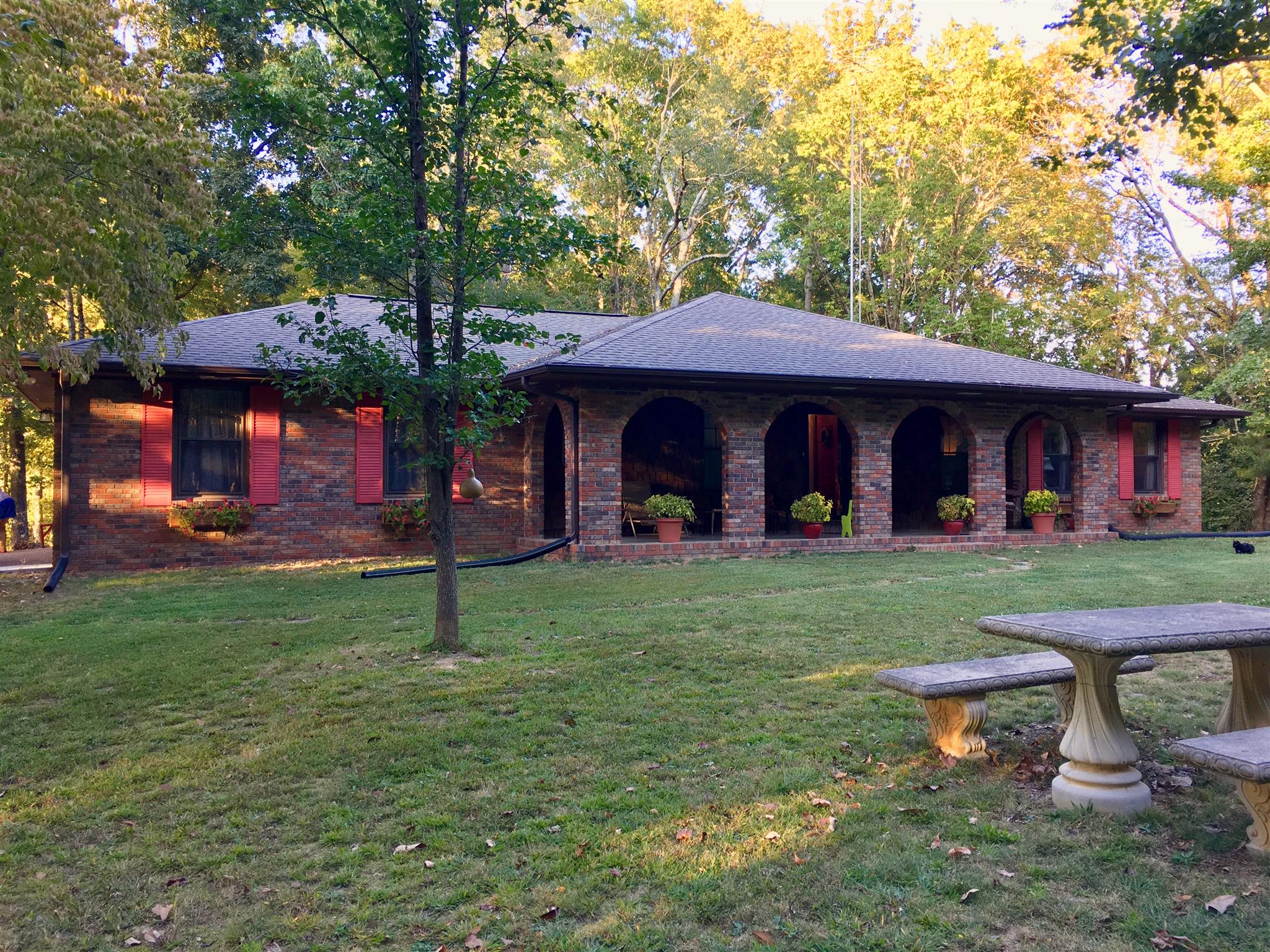 206 Bonnertown Road Five Points, TN 38457 - Photo 1 of 28 a view of a house with a yard porch and sitting area