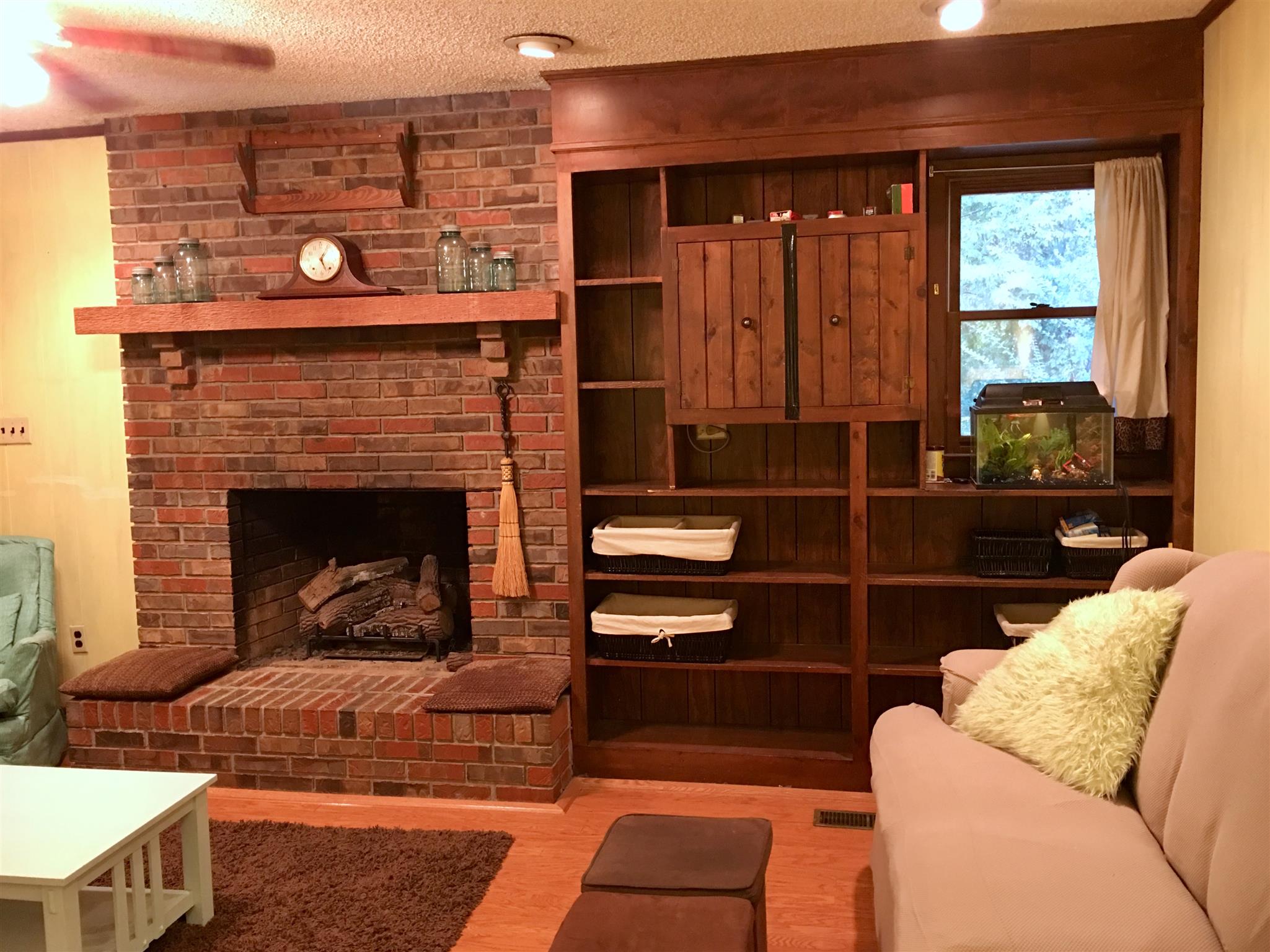 206 Bonnertown Road Five Points, TN 38457 - Photo 15 of 28 a living room with furniture a window and a fireplace
