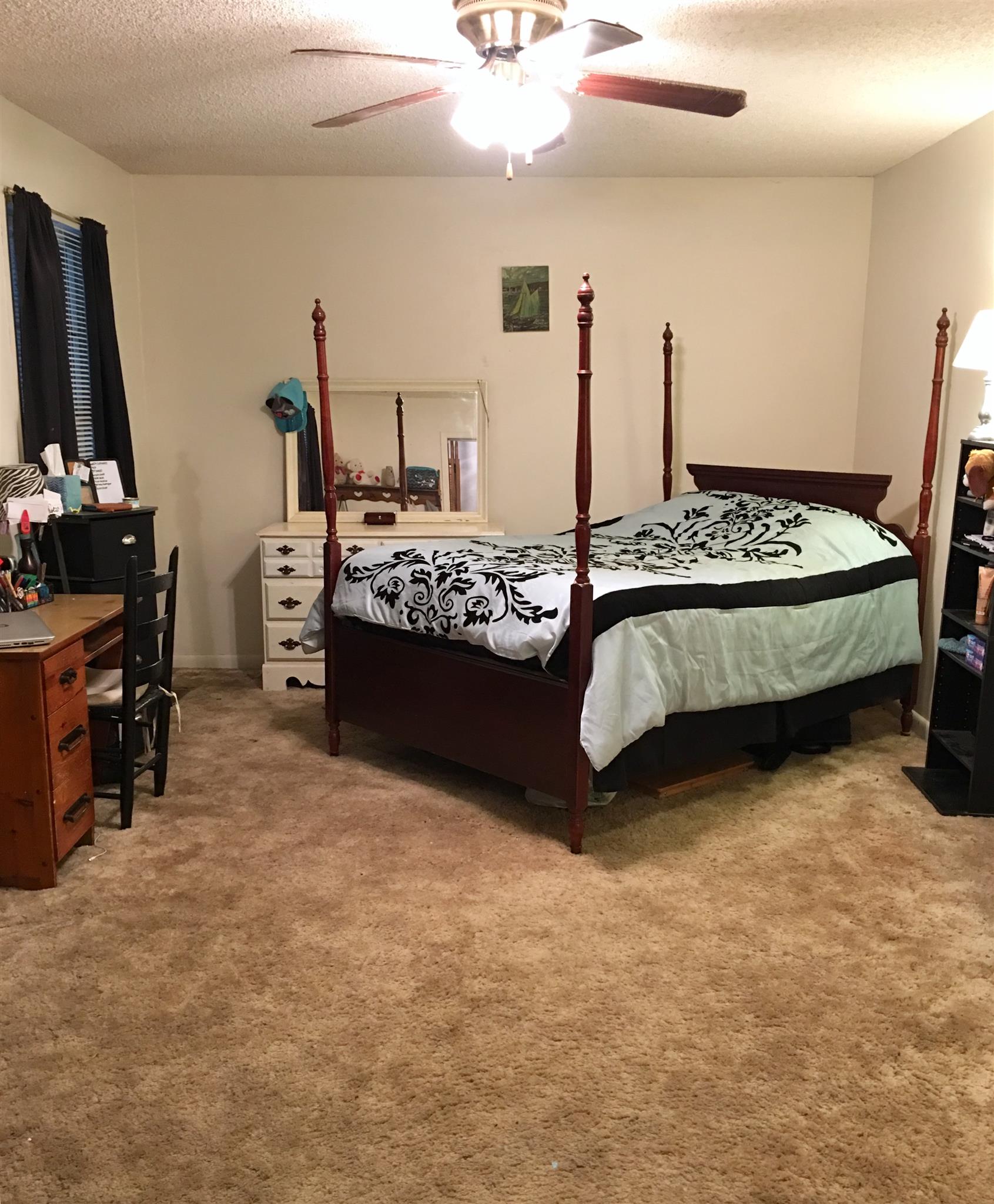 206 Bonnertown Road Five Points, TN 38457 - Photo 18 of 28 a bed sitting in a room next to a window