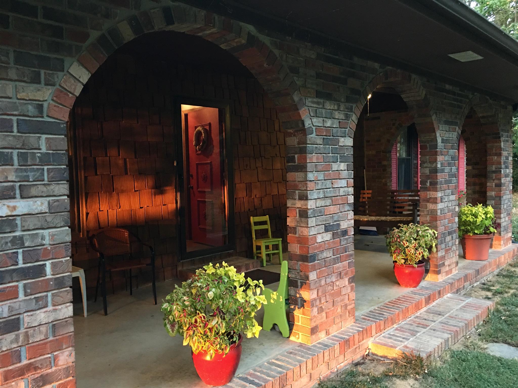 206 Bonnertown Road Five Points, TN 38457 - Photo 5 of 28 a front view of a house with flowers