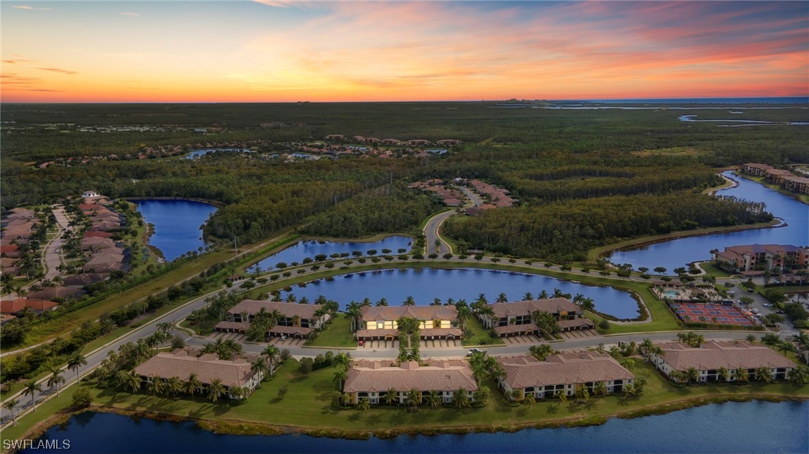 a view of a city with a lake
