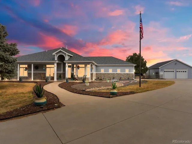 a front view of a house with swimming pool