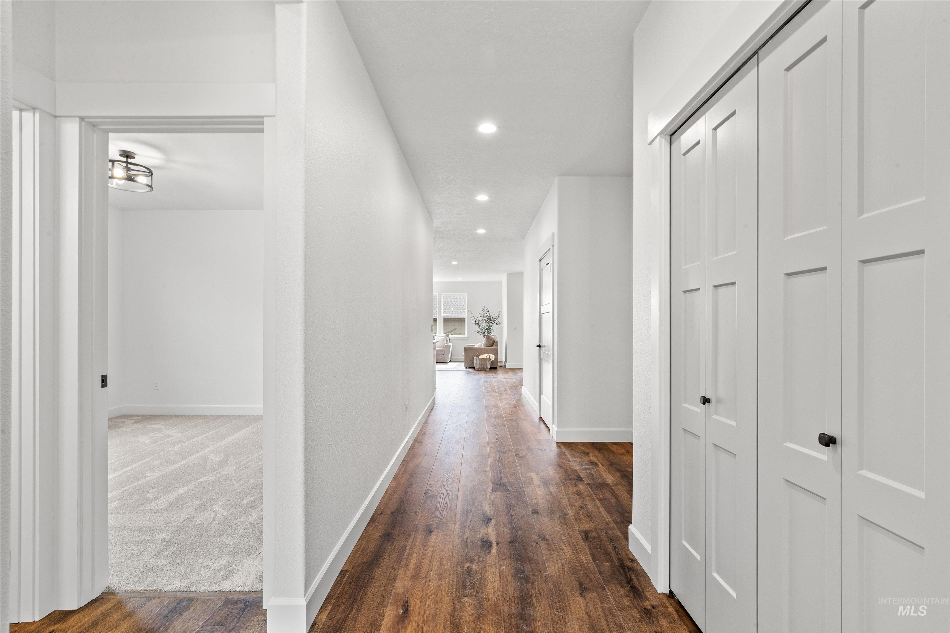 1724 Pathway Court Lewiston, ID 83501 - Photo 18 of 38 Corridor featuring recessed lighting and dark wood-style floors