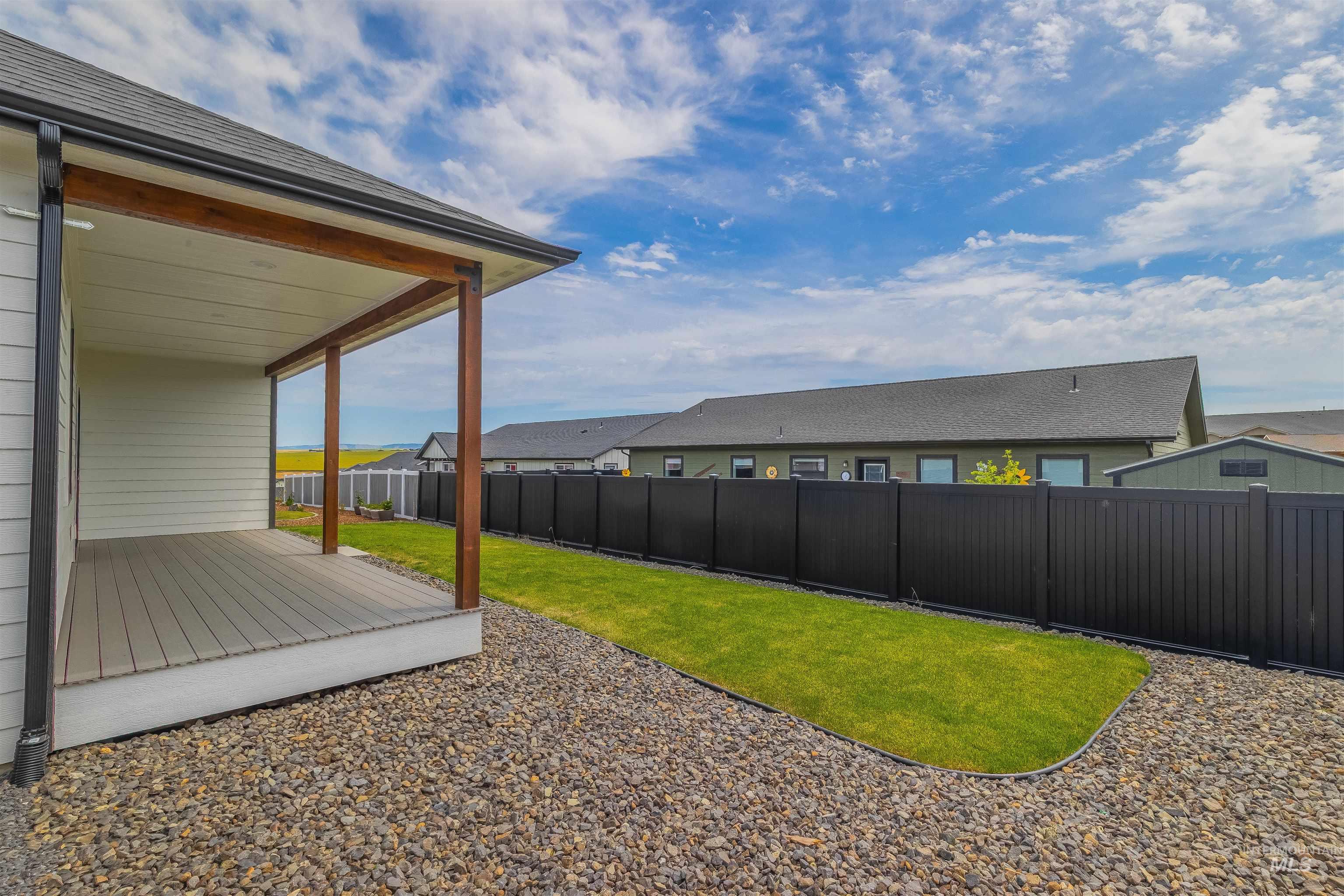1724 Pathway Court Lewiston, ID 83501 - Photo 33 of 38 Fenced backyard featuring a patio and a residential view