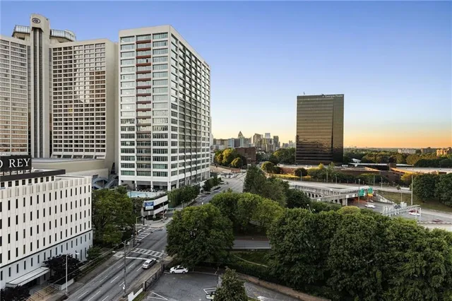 a view of a city with tall buildings