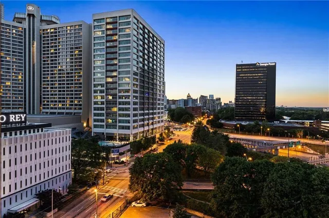 a view of a city with tall buildings