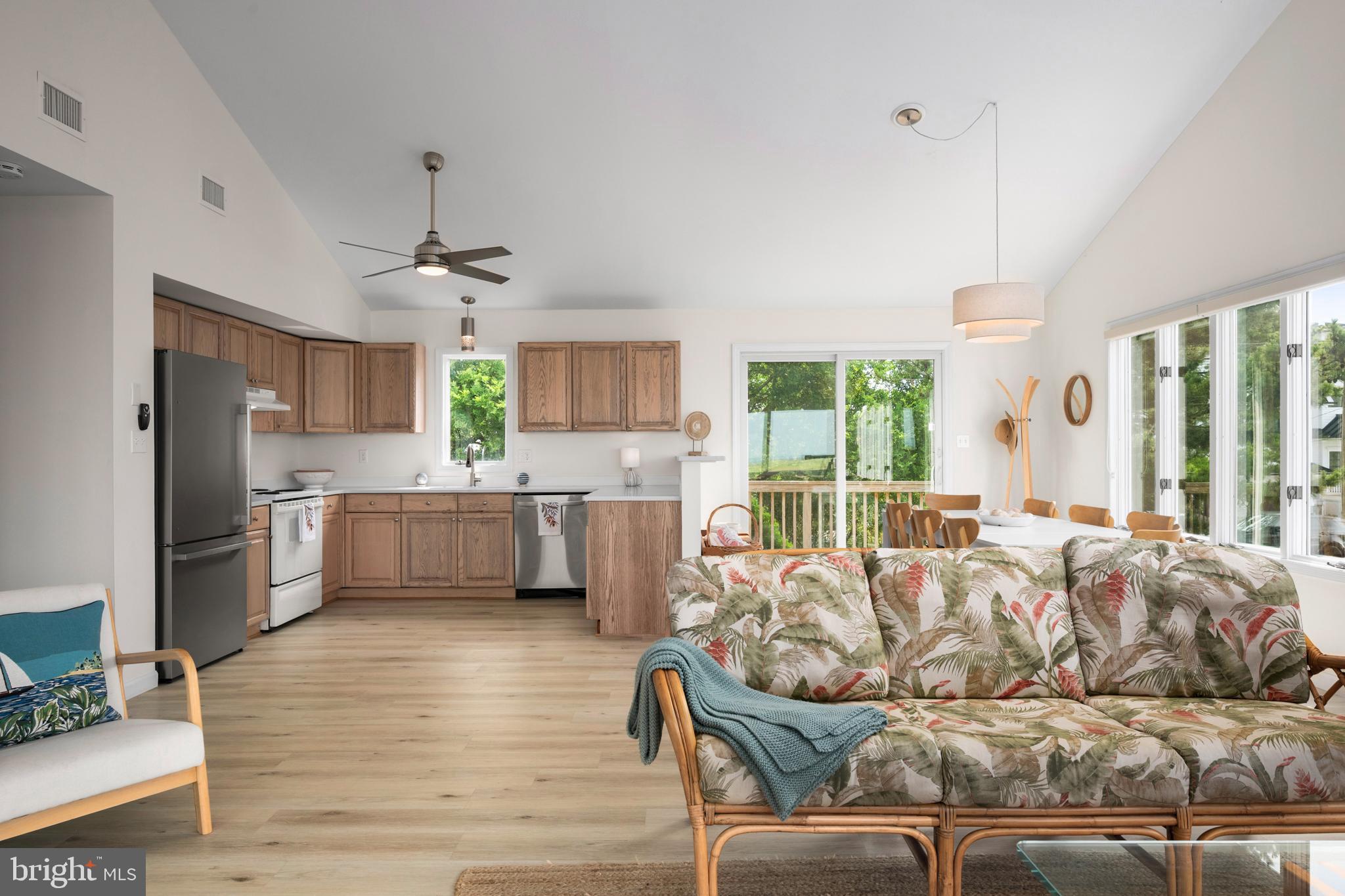 26 Butler Road Long Beach Township, NJ 08006 - Photo 14 of 44 a living room with furniture kitchen and a large window