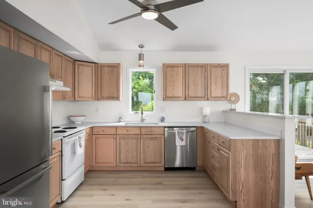 a view of a swimming pool and an outdoor seating