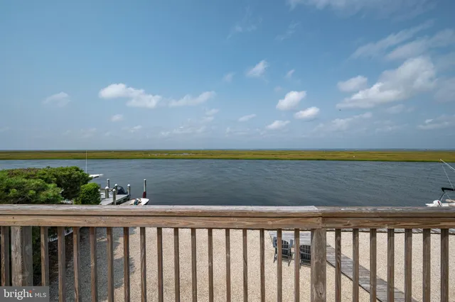 a view of swimming pool with outdoor seating and yard