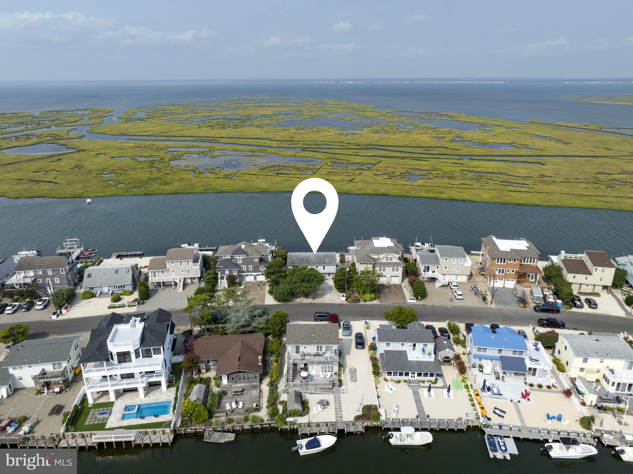 26 Butler Road Long Beach Township, NJ 08006 - Photo 24 of 44 a view of a dining room with lots of white furniture