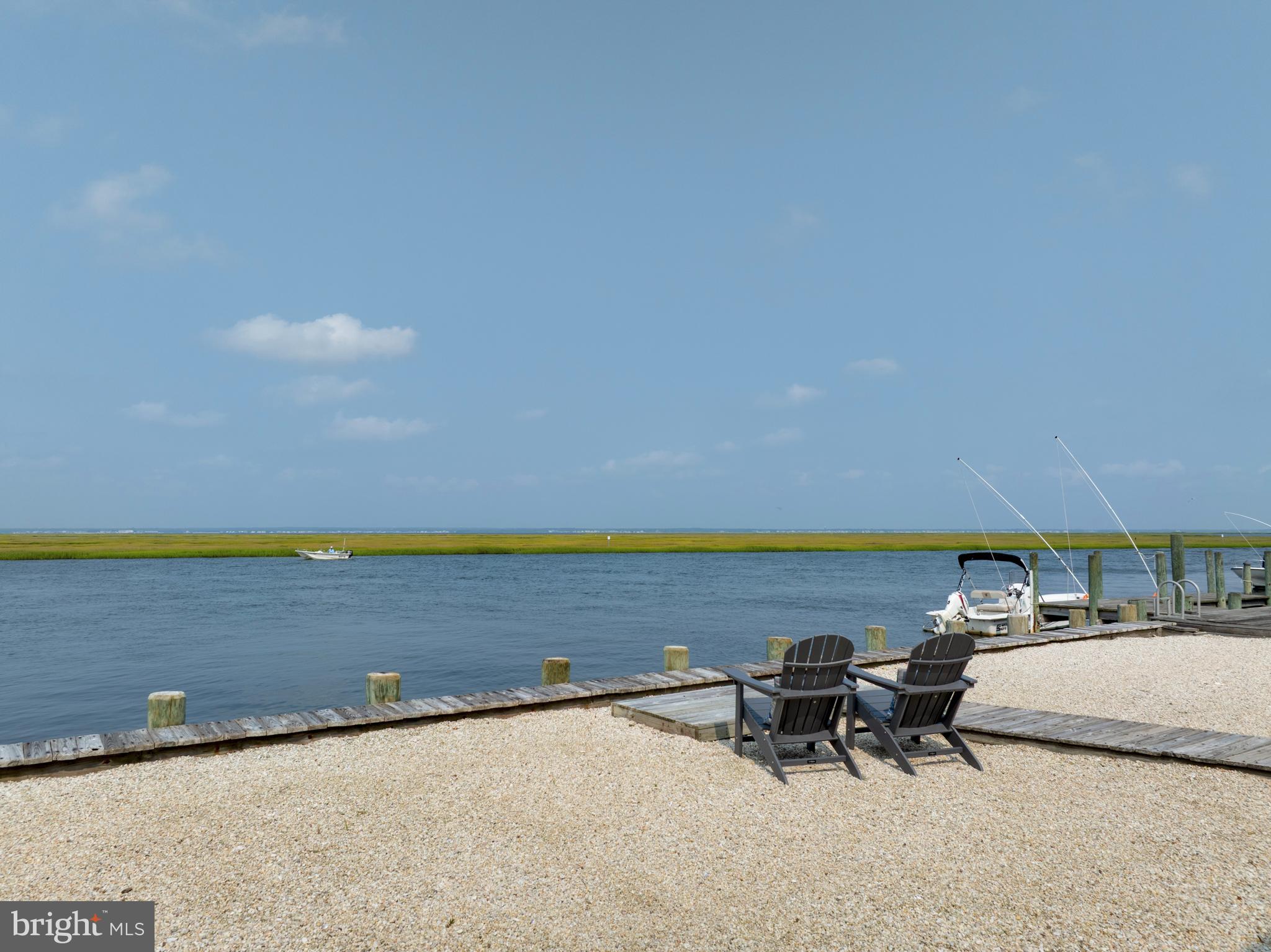 26 Butler Road Long Beach Township, NJ 08006 - Photo 25 of 44 a view of swimming pool with outdoor seating and yard
