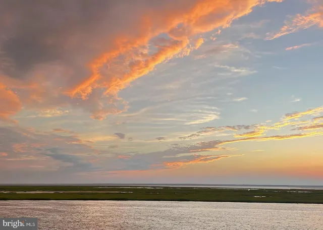 a view of a lake with a mountain