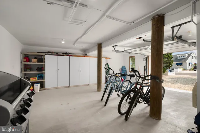 an aerial view of a house with a backyard space