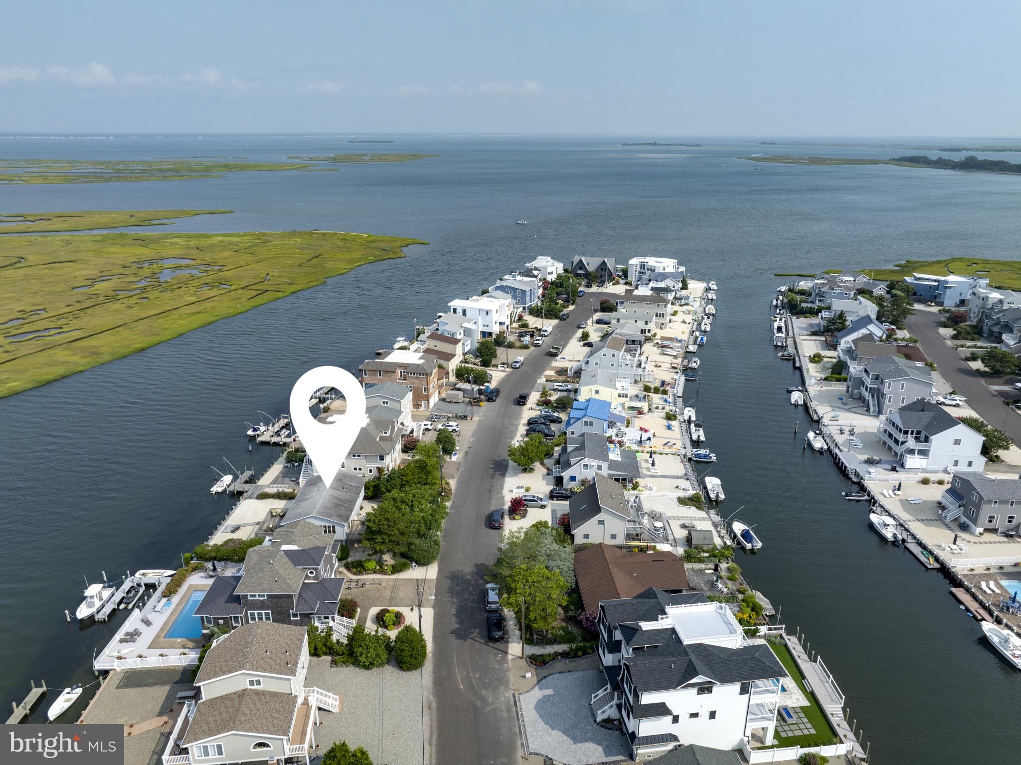 26 Butler Road Long Beach Township, NJ 08006 - Photo 43 of 44 an aerial view of a house with a ocean view