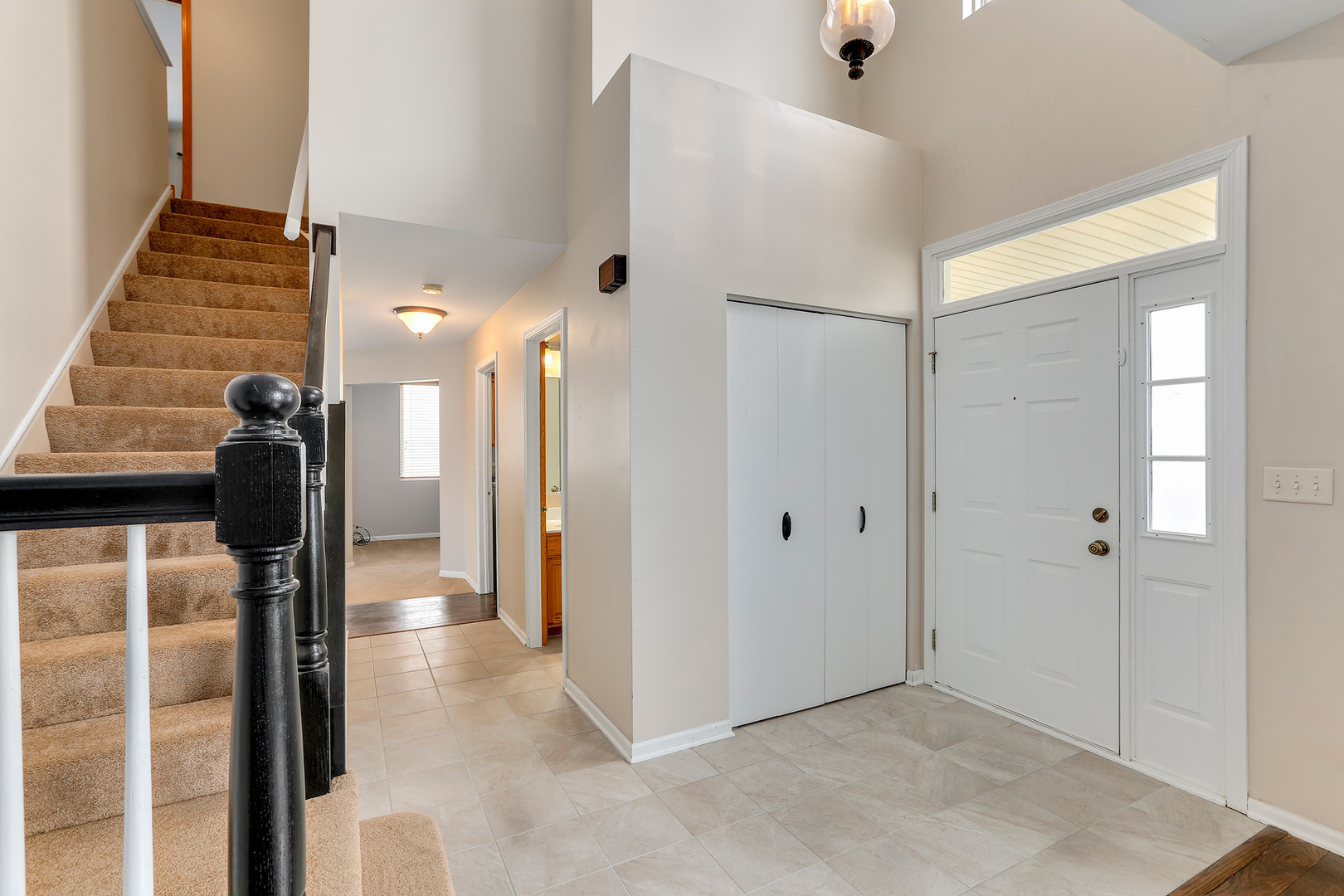 24340 Hemlock Drive Plainfield, IL 60585 - Photo 2 of 33 a view of hallway with wooden floor