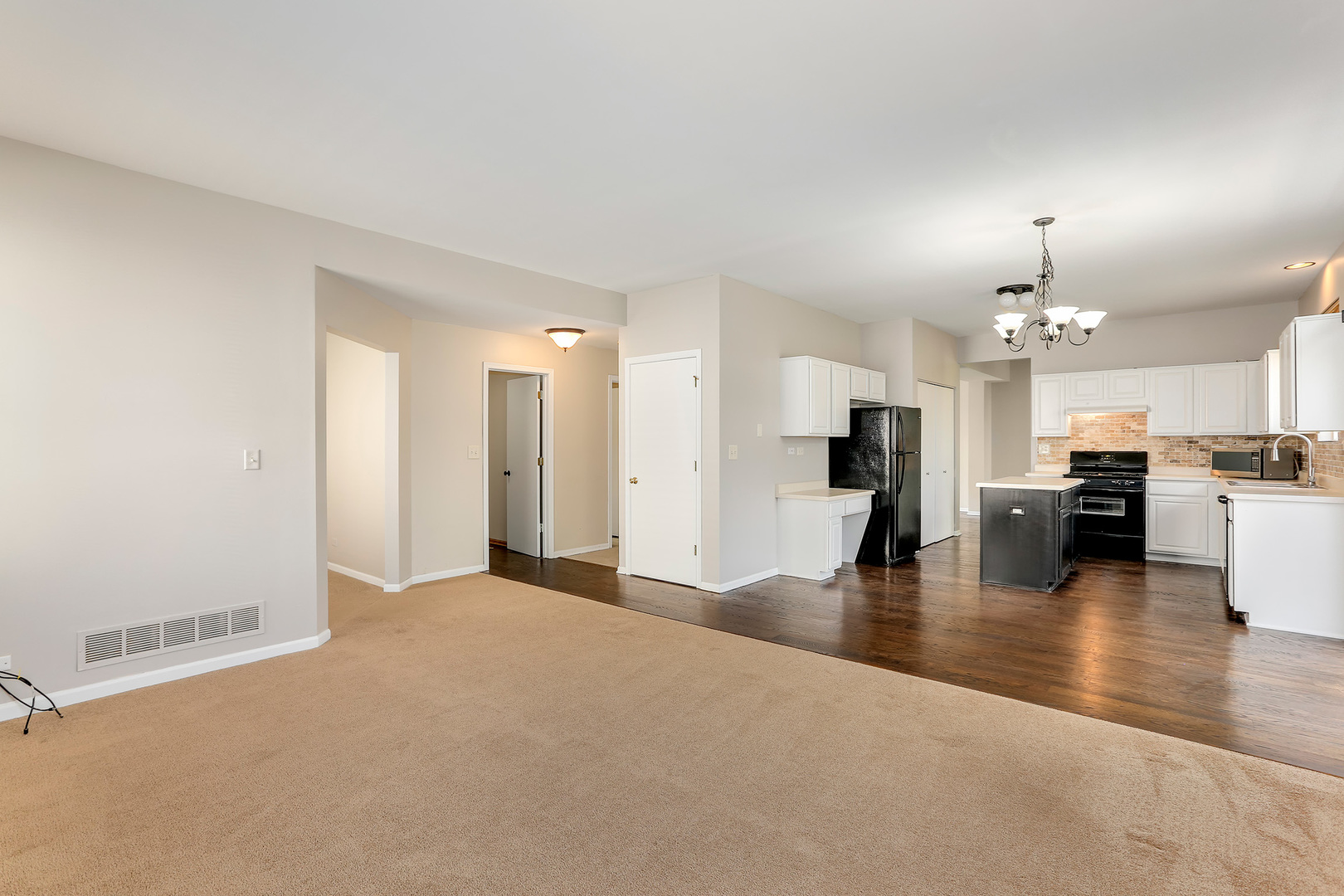 24340 Hemlock Drive Plainfield, IL 60585 - Photo 15 of 33 a view of a kitchen and dining room