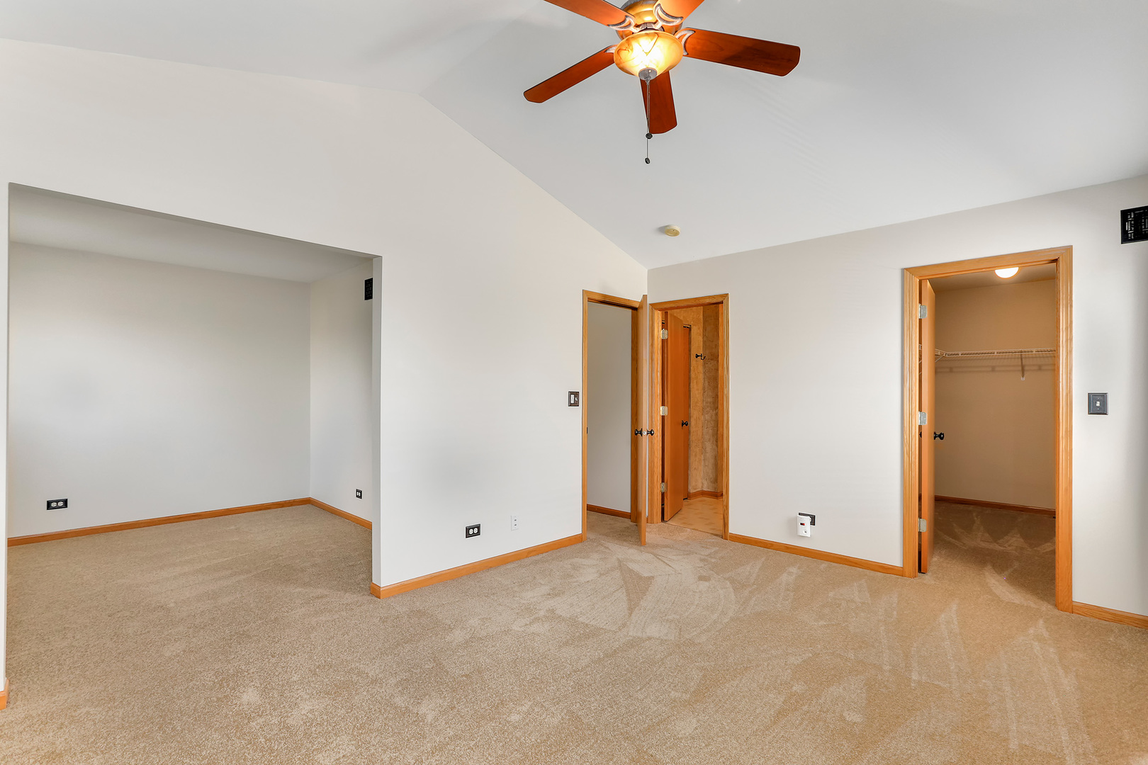 24340 Hemlock Drive Plainfield, IL 60585 - Photo 23 of 33 an empty room with closet and a chandelier fan