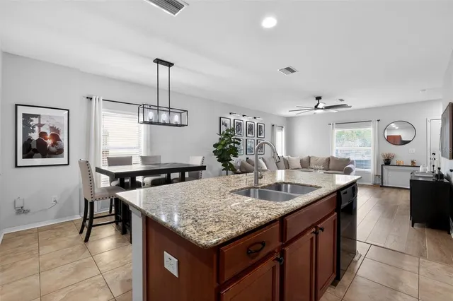 a kitchen with a counter space cabinets and appliances