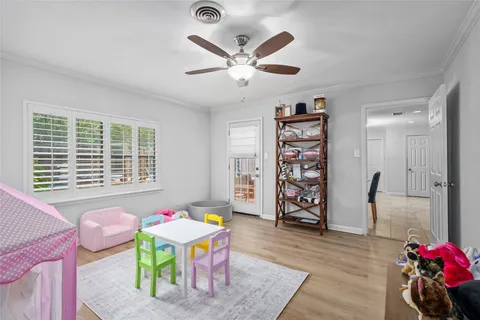 a work room with furniture and window