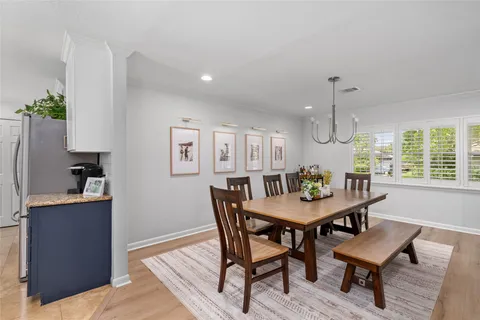 a view of a dining room with furniture