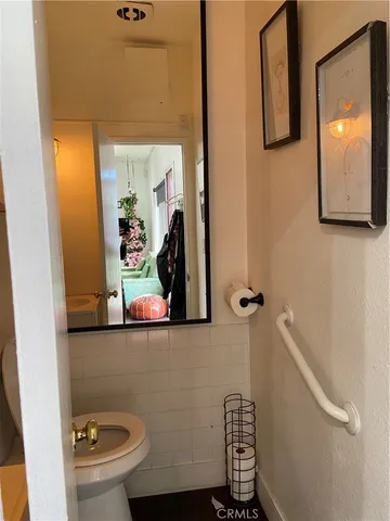 a bathroom with a toilet and a sink