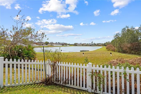 a view of a lake from a yard