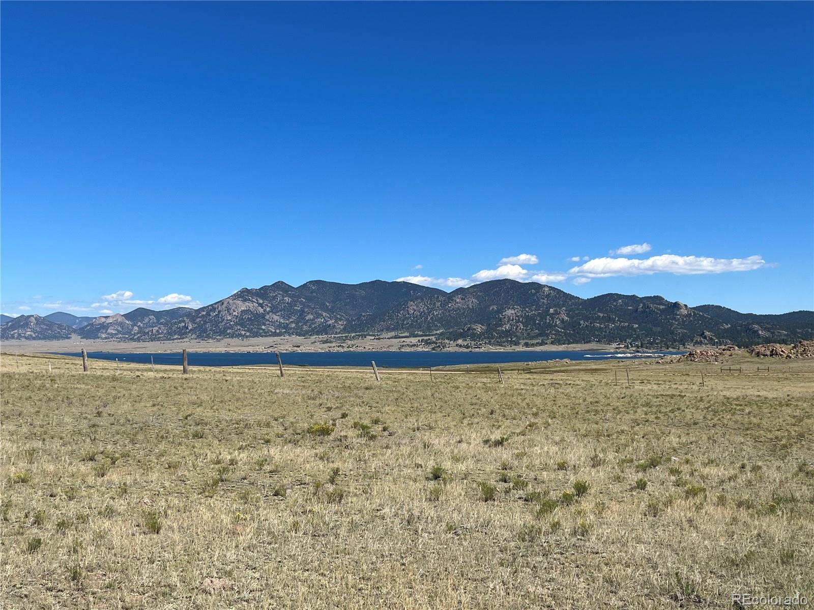 Ken Road Florissant, CO 80816 - Photo 11 of 16 a view of an ocean with a mountain in the background