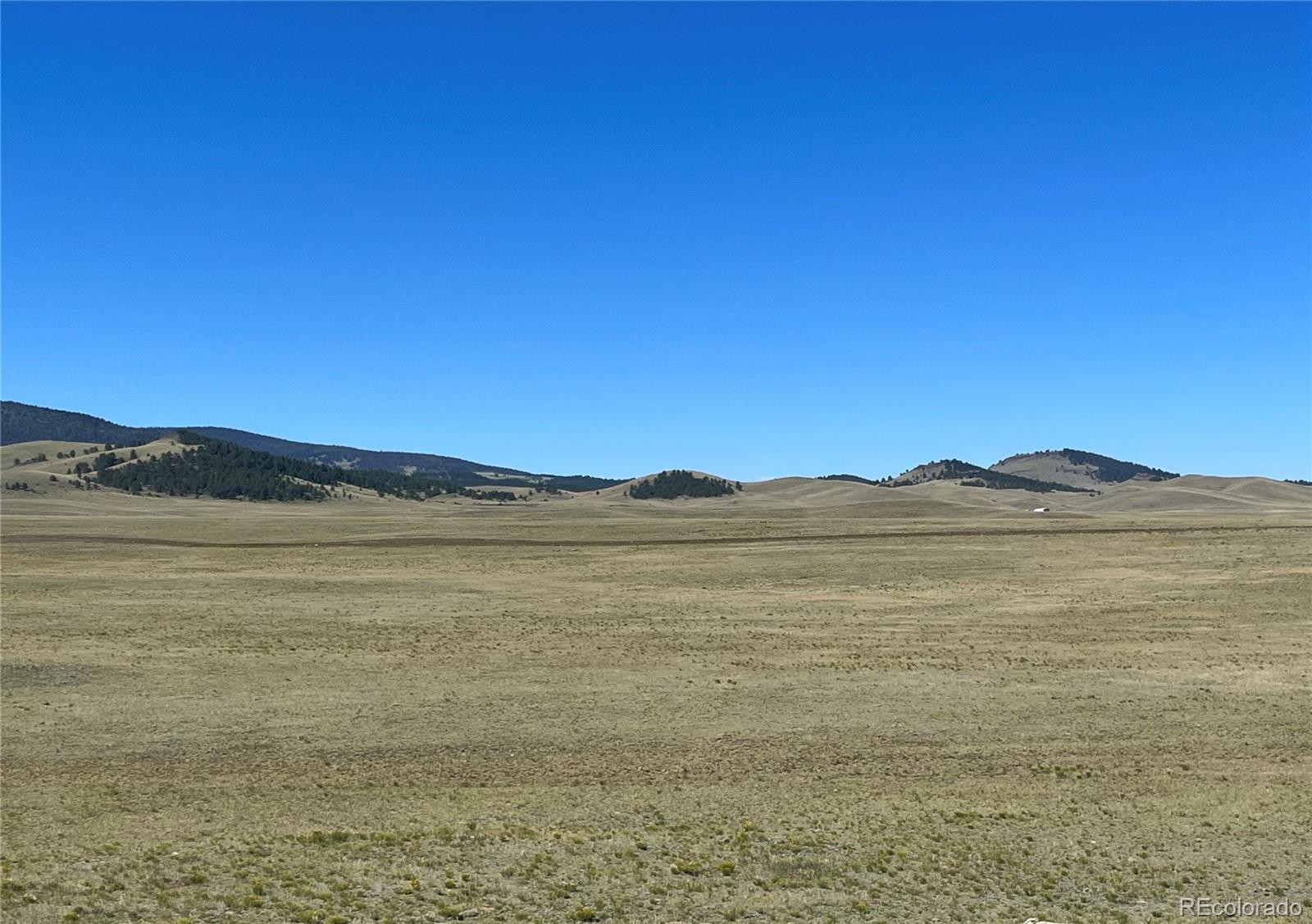 Ken Road Florissant, CO 80816 - Photo 9 of 16 a view of an ocean with a mountain