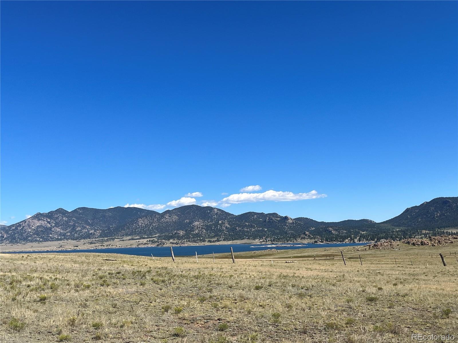 Ken Road Florissant, CO 80816 - Photo 10 of 16 a view of an lake with a mountain in the background