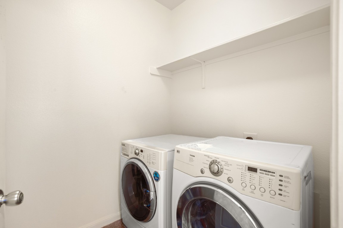 14504 Callan Court Manor, TX 78653 - Photo 14 of 22 a utility room with dryer and washer