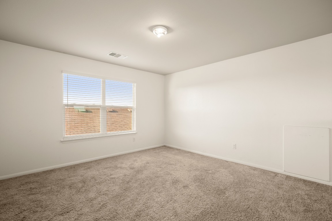 14504 Callan Court Manor, TX 78653 - Photo 17 of 22 an empty room with a window