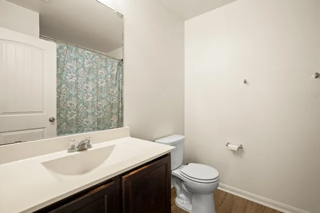 a bathroom with a sink and a toilet