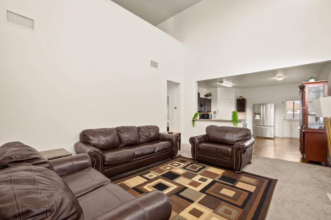 14504 Callan Court Manor, TX 78653 - Photo 2 of 22 a living room with furniture rug and couch