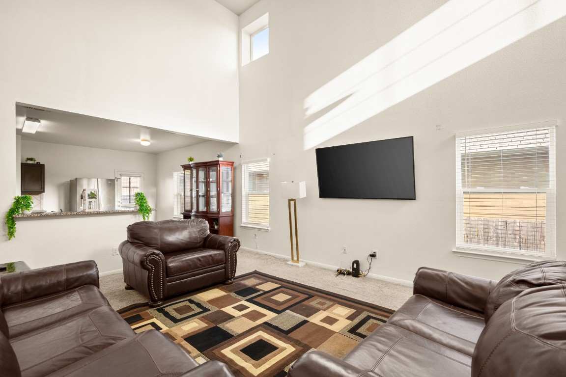 14504 Callan Court Manor, TX 78653 - Photo 4 of 22 a living room with furniture and a flat screen tv