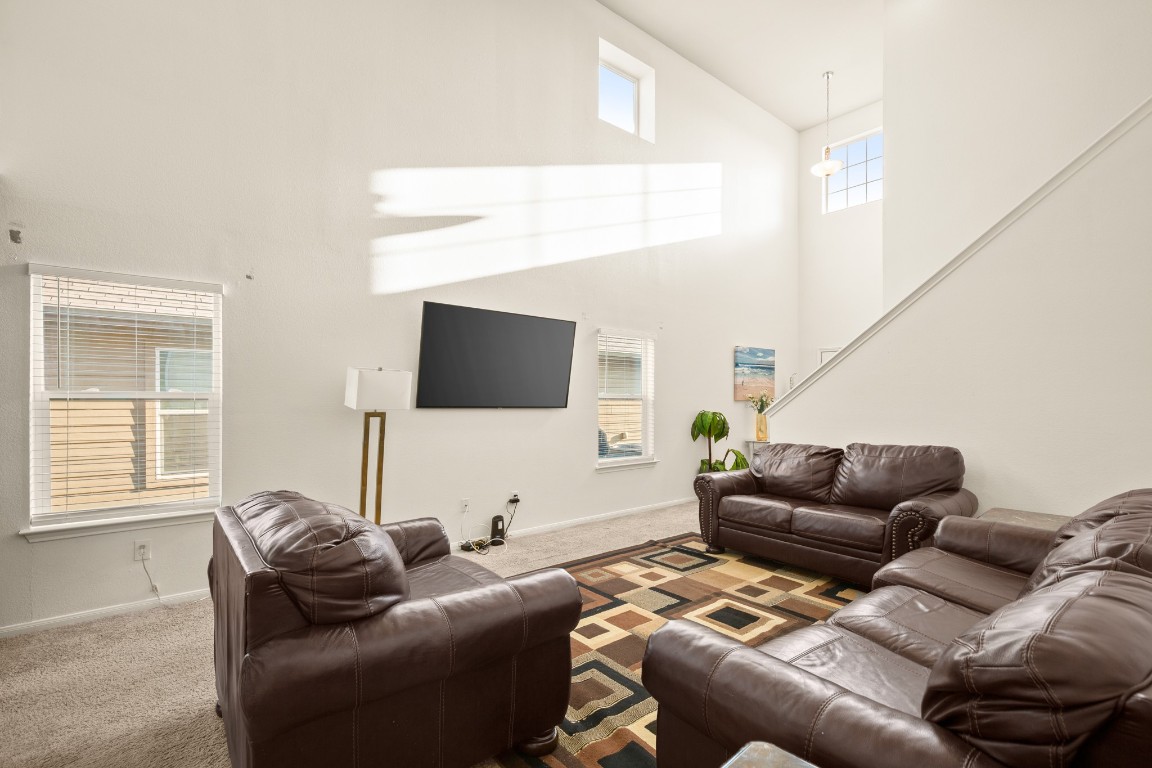 14504 Callan Court Manor, TX 78653 - Photo 5 of 22 a living room with furniture and a flat screen tv