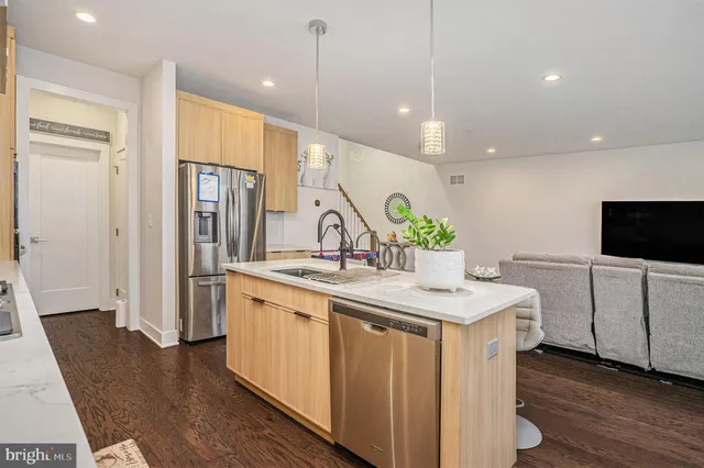 a kitchen with counter top space and a sink