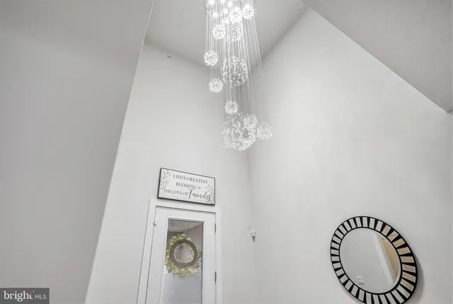 a bathroom with a mirror and a shower